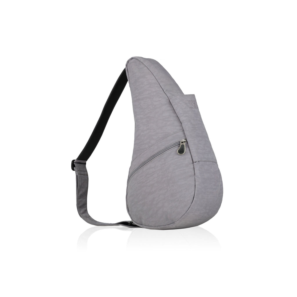 A healthy back bag shown from the side view in pebble grey textured nylon